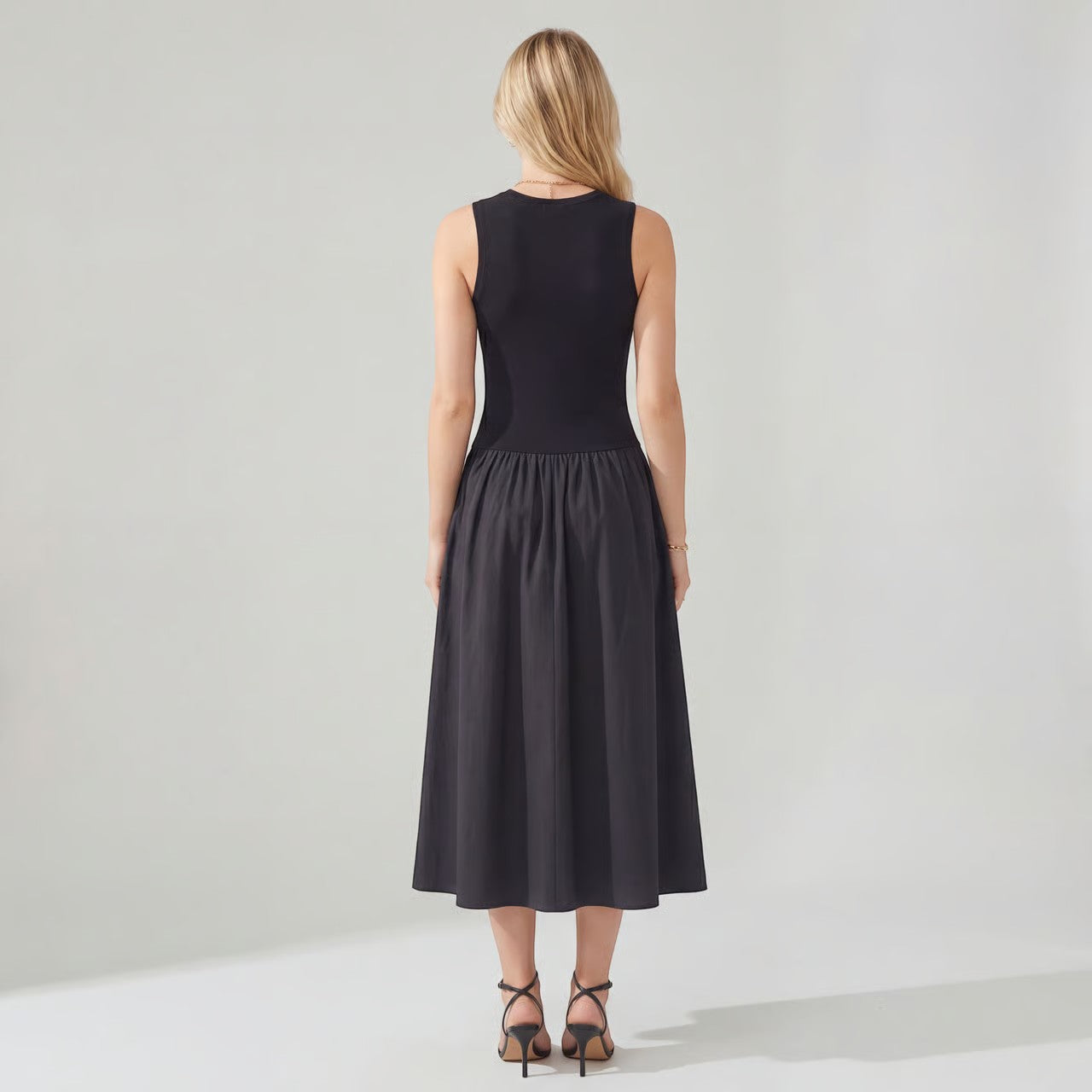 Riche | Femme Robe Midi Évasée Sans Manches en Maille Côtelée