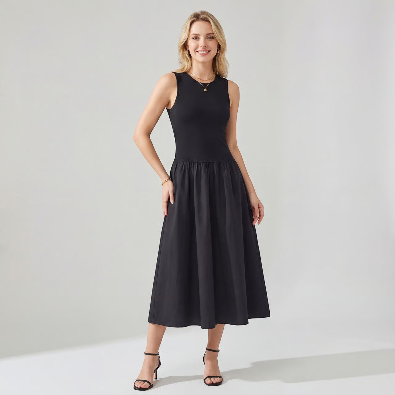 Riche | Femme Robe Midi Évasée Sans Manches en Maille Côtelée